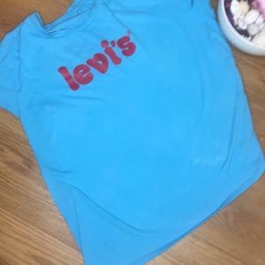 Blue Levi’s shirt